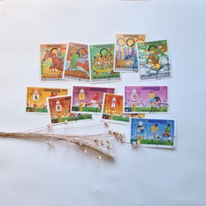 Vintage postzegels Cambodja Khmer Republiek/sport voetbal/Fifa Wereldbeker/Olympische Spelen 1976/collectie jaren 70/geperforeerd gestempeld/serie