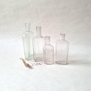 Vintage 4 flasks bottles/colorless glass/laboratory pharmacy/apothecary remedy/antique old decoration/curiosity cabinet/French chemist