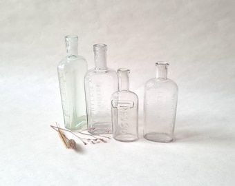 Vintage 4 flasks bottles/colorless glass/laboratory pharmacy/apothecary remedy/antique old decoration/curiosity cabinet/French chemist