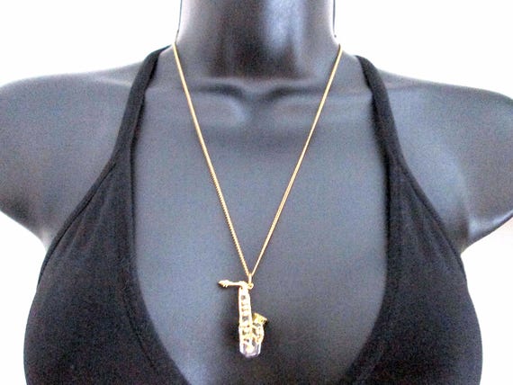 Wonderful Vintage Pendant Necklace Swarovski Swan Mark Figural Clear Faceted Crystal Saxophone Musical Instrument Shiny Gold Tone Signed View 4