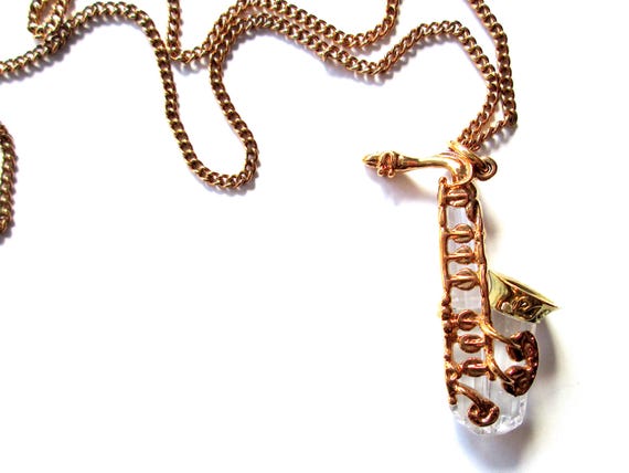 Wonderful Vintage Pendant Necklace Swarovski Swan Mark Figural Clear Faceted Crystal Saxophone Musical Instrument Shiny Gold Tone Signed