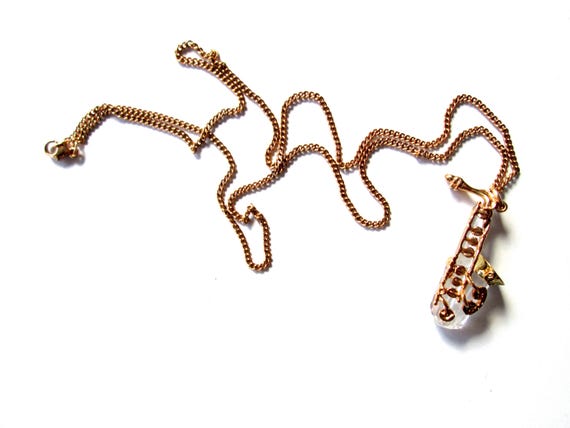 Wonderful Vintage Pendant Necklace Swarovski Swan Mark Figural Clear Faceted Crystal Saxophone Musical Instrument Shiny Gold Tone Signed View 3