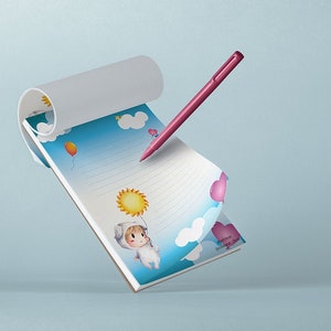 Puede incluir: Un bloc de notas azul y blanco con una ilustración de dibujos animados de un niño sosteniendo un globo. El bloc de notas tiene páginas rayadas y un bolígrafo rosa está encima. El bloc de notas tiene el texto "wish upon a common star" en la esquina inferior derecha.