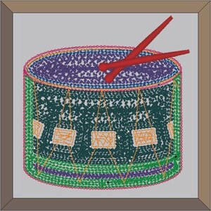 May include: A green, purple, and orange drum with red drumsticks. The drum is made of a textured material and has a circular shape.