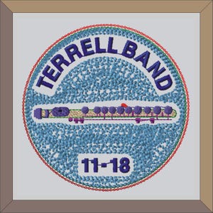 May include: A blue and white embroidered patch with the text "TERRELL BAND 11-18" in a circle. The patch features a stylized image of a flute.
