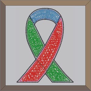 May include: A green, red, and blue ribbon tied in a bow. The ribbon is made of a textured material and has a speckled appearance.