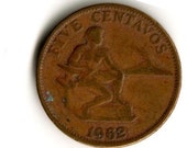 1962 1 centavos USA Philippines Centavo last year Male seated beside hammer and anvil. An active volcano (Mt. Mayon) blacksmithing coin