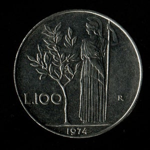 May include: A silver Italian coin with the year 1974, the denomination L.100, a tree, and a woman holding a staff.