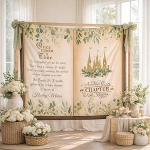 May include: A large backdrop with a wooden frame, decorated with a fairytale theme. The backdrop features text that reads "Once upon a time" and "A New Chapter Begins..." with a castle illustration. Floral arrangements and baskets of flowers are in the foreground.