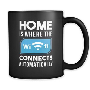 May include: Black coffee mug with white text that reads "Home is where the wi-fi connects automatically". The text is surrounded by a blue wifi symbol.