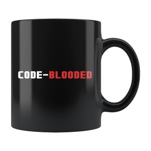 May include: Black ceramic coffee mug with white text that reads "CODE-BLOODED" in a pixelated font. The word "BLOODED" is in red.