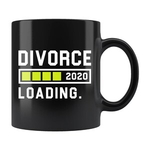 May include: Black coffee mug with white text that reads "DIVORCE LOADING."  A progress bar with four green bars is below the text, and the year "2020" is to the right of the progress bar.