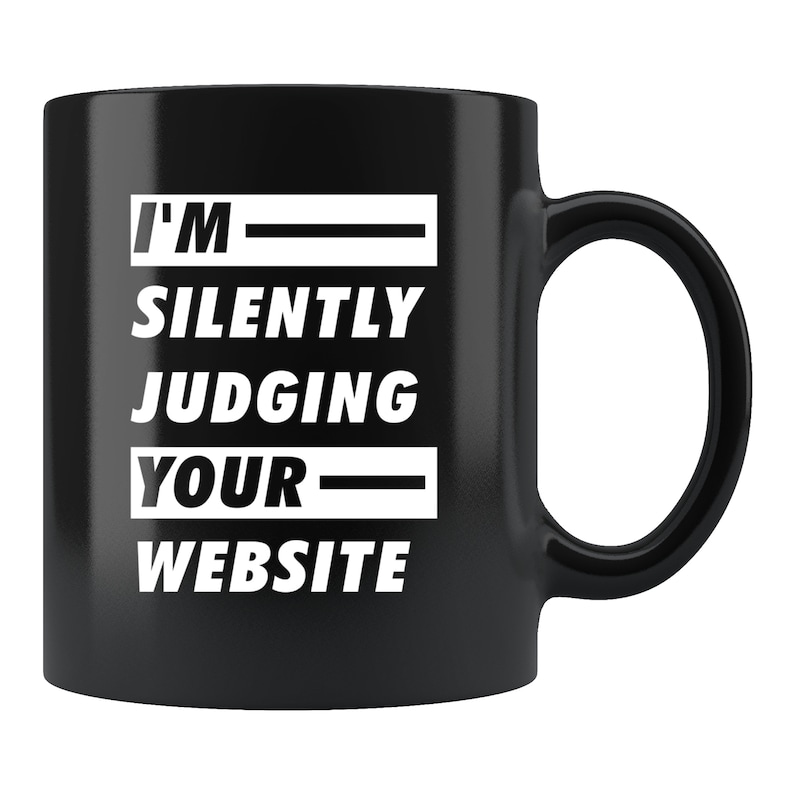 May include: Black coffee mug with white text that reads "I'm silently judging your website".