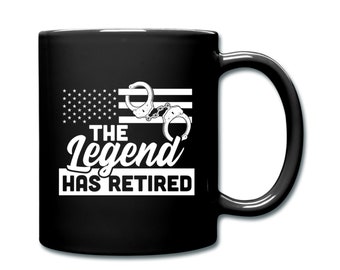 May include: Black coffee mug with a white design of an American flag with handcuffs and the text "The Legend Has Retired".