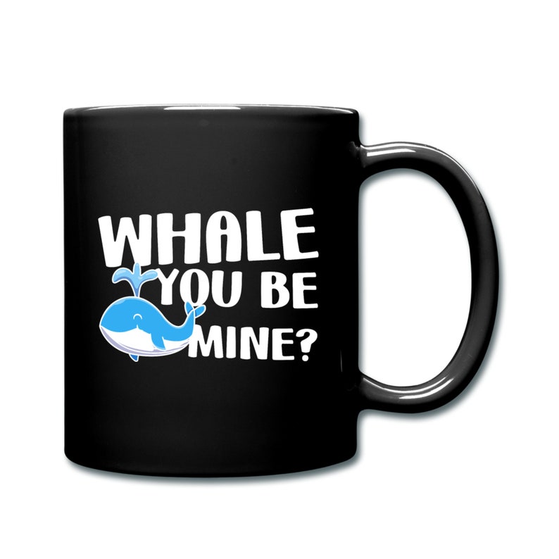 May include: Black coffee mug with a white whale illustration and the text "Whale you be mine?"