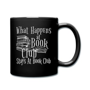 May include: Black coffee mug with white text that reads "What Happens at Book Club Stays at Book Club". The text is surrounded by a drawing of a stack of books and an open book.