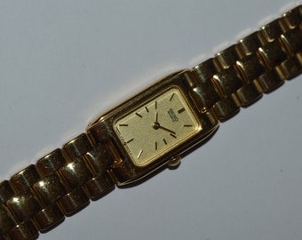 Retro feb 1990 NOS Seiko 2E20 6130 Gold Tone Base Metal St. Steel Back Quartz Dameshorloge w 7 9mm Seiko Base Metal Band Etsy Nederland