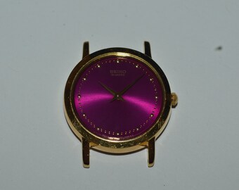 Vintage SEIKO 1N00-0A29 Quartz Watch SXJ454 Dummy Salesman Sample 25.5mm Violet Dial Round Case Circa 1990 For Parts Only