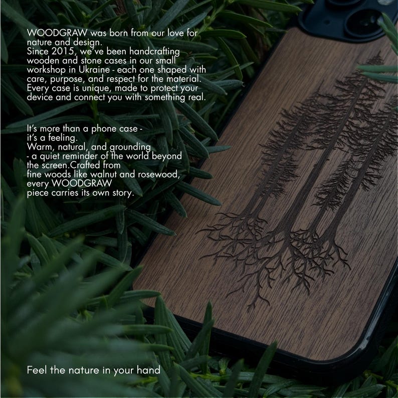 May include: A wooden phone case with a dark brown finish, featuring an engraved design of several trees. The case is surrounded by green foliage. The text on the case reads "WOODGRAW" and "Feel the nature in your hand."