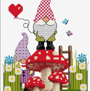 May include: A cross-stitch pattern featuring two gnomes. One gnome stands on a large red mushroom with white spots, holding a red heart-shaped balloon. A second gnome stands beside the mushroom. A brown ladder, green grass, and flowers are included.