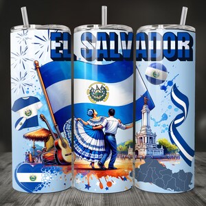 May include: A set of three stainless steel tumblers with a blue and white design featuring the flag of El Salvador, a dancing couple in traditional clothing, and a monument. The tumblers have a white background with blue and white paint splatters.