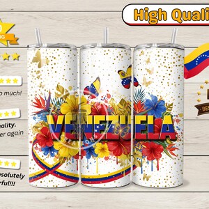May include: A white tumbler with a design featuring the word "VENEZUELA" in red, yellow, and blue, surrounded by colorful flowers, butterflies, and gold confetti. The design incorporates the Venezuelan flag colors.
