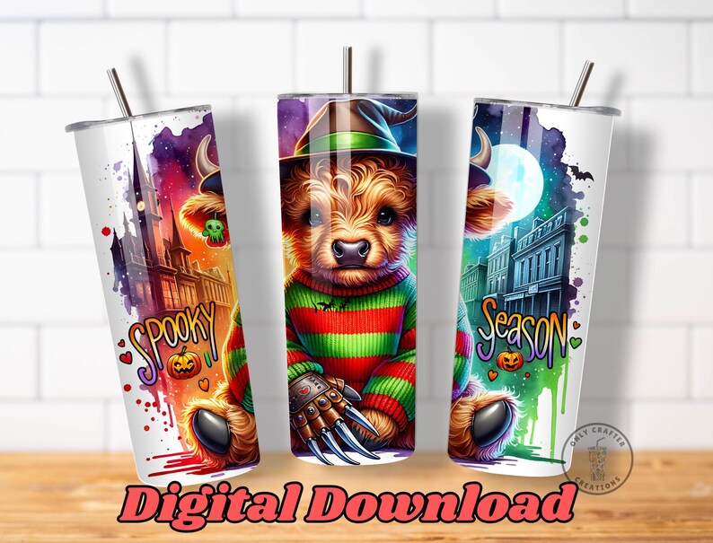 May include: Three white stainless steel tumblers with Halloween-themed designs. Each tumbler features a cartoon bear dressed as Freddy Krueger, with the words "Spooky" and "Season" in colorful text. The tumblers have a straw.