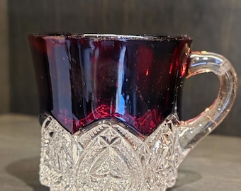 Antique Early American Pattern Glass (EAPG) mug with a ruby flash stain with Button Arches