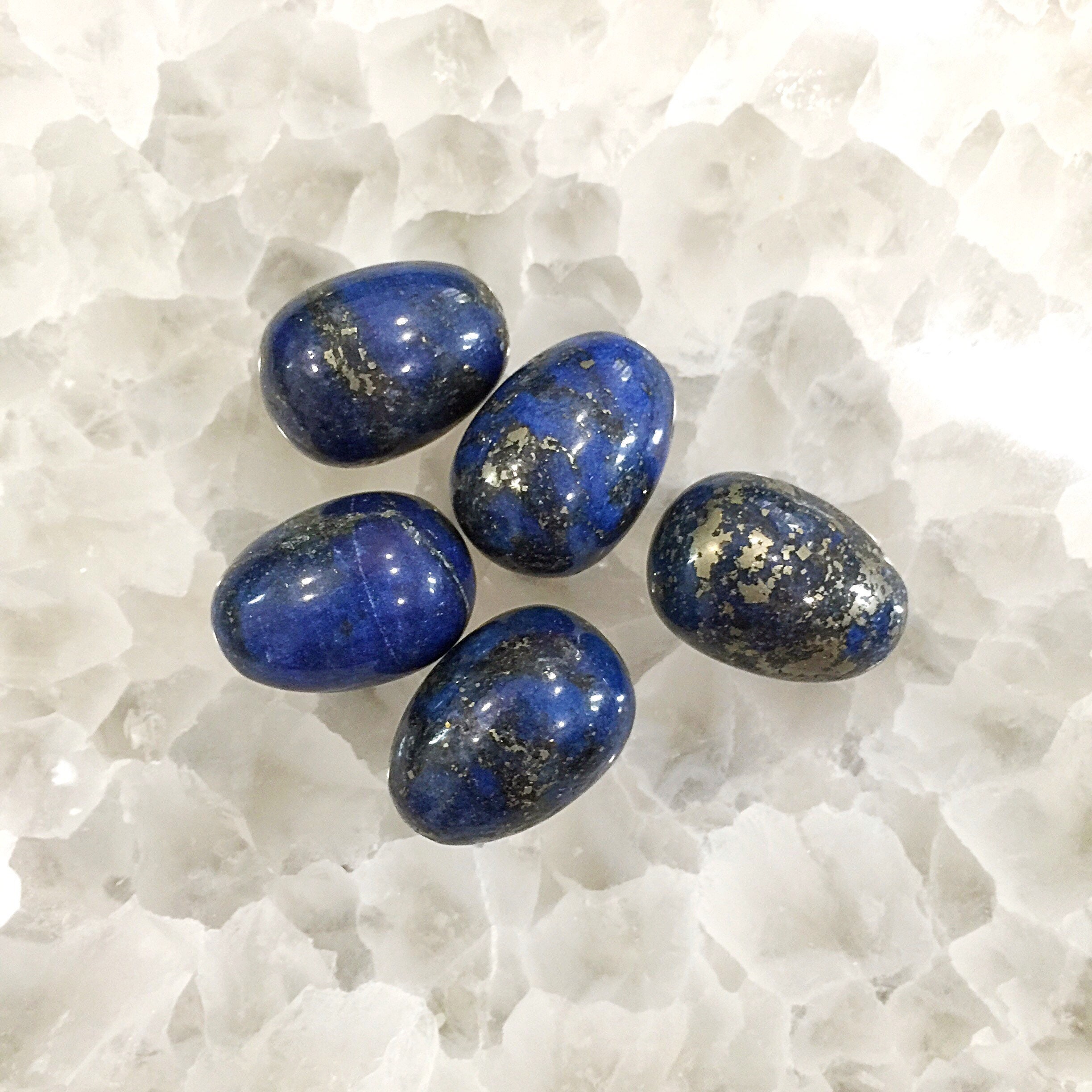 Natural Lapis Lazuli petite gemstone egg. Hand carved blue yoni