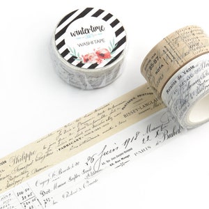 May include: Two rolls of decorative washi tape with a vintage aesthetic. One roll features a black and white striped background with a floral design and the text "wintertime washi tape". The other roll features a beige background with black script text.