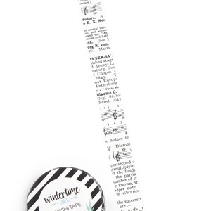 Washi tape with details from a vintage music dictionary. White background.