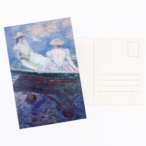May include: A postcard with an impressionist painting of two people in a boat on a lake. The artwork shows figures in white dresses and hats, with reflections in the water. The back of the postcard is blank with lines for writing.