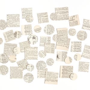 May include: A collection of vintage newspaper clippings and paper circles, all in shades of cream and white, scattered on a white background. The clippings feature various text and images, creating a unique and eclectic aesthetic.