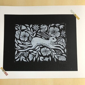 Leaping Hare in Flower Field