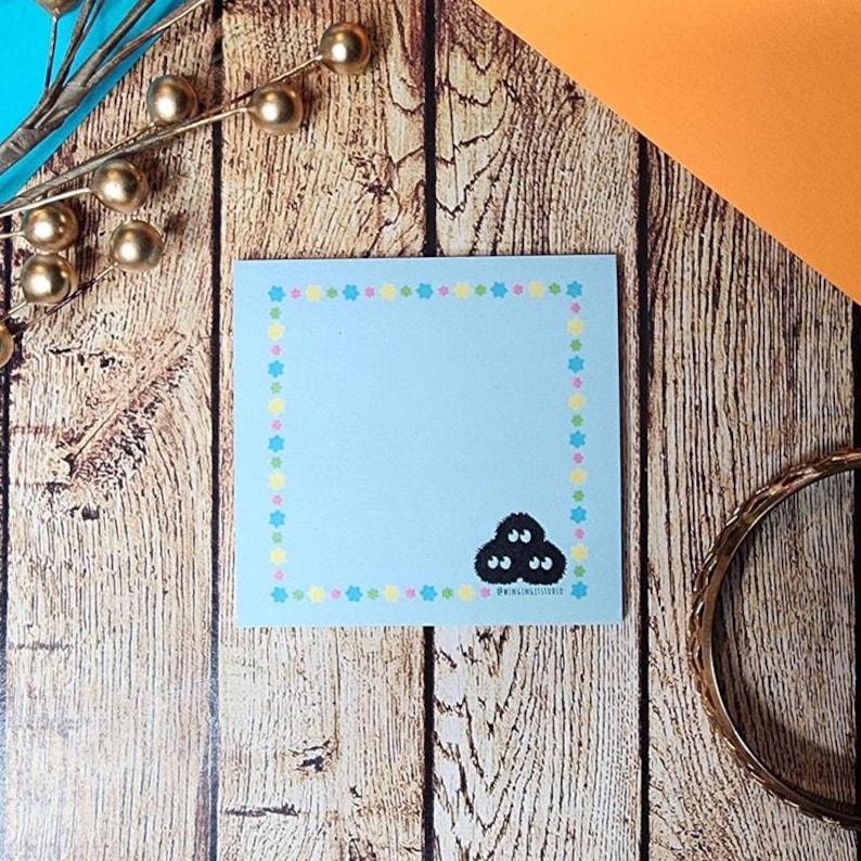 Blue sticky note with soot sprite with konpeito candy border inspired by Studio Ghibli.
