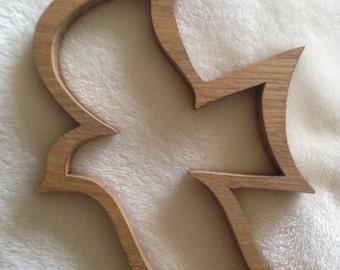 The medium sized "Dove", crafted as a symbolic figure of the Holy Spirit, fosters a creative approach in displaying one's faith.