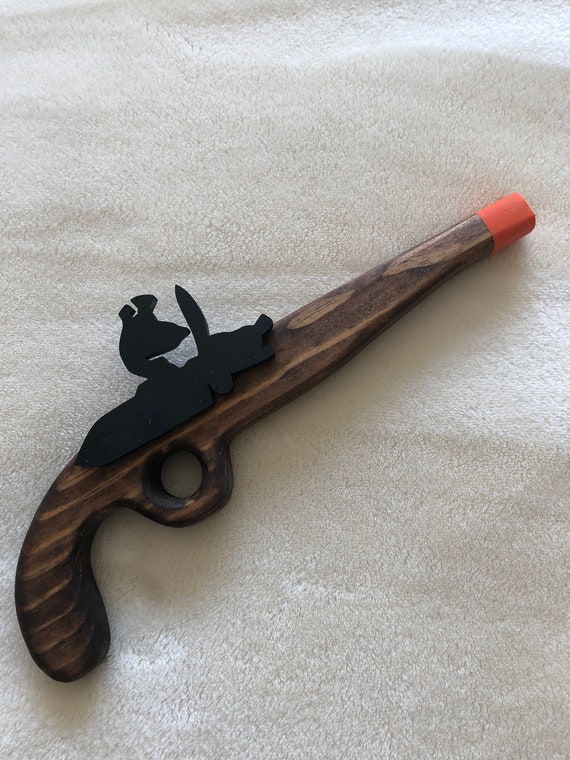pistolet jouet en icône de style plat, accessoire pour enfants
