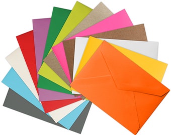 May include: A collection of colorful envelopes in various shades of red, pink, orange, yellow, green, blue, and gray. The envelopes are arranged in a fan shape, with the orange envelope in the foreground.