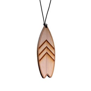 May include: A wooden surfboard pendant necklace with a chevron design. The pendant is brown and has a black cord.