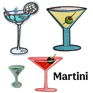 May include: Embroidered patches featuring various martini cocktail designs. The patches showcase a blue cocktail with a lemon slice, a yellow martini with an olive, a red martini with an olive, and a small green martini with an olive. The word "Martini" is also displayed.