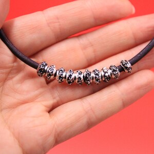 0/3 MADE in EUROPE 10 silver sliders with black patina, 4mm cord spacers, 4mm cord sliders, rondelle beads for 4mm cord (X3482AS) Qty10
