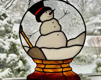 Stained glass Snow globe snowman in winter wonderland