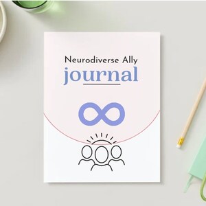 May include: A white journal with the text "Neurodiverse Ally journal" in black and a purple infinity symbol. The journal has a pink and white background with a red line around the edge. There are three black stick figures with a sun above them.