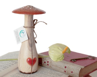 Tall Orange Wooden Mushroom with a Broken Heart