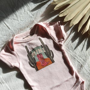 Girls Pink MINI western graphic Tshirt/onesie.