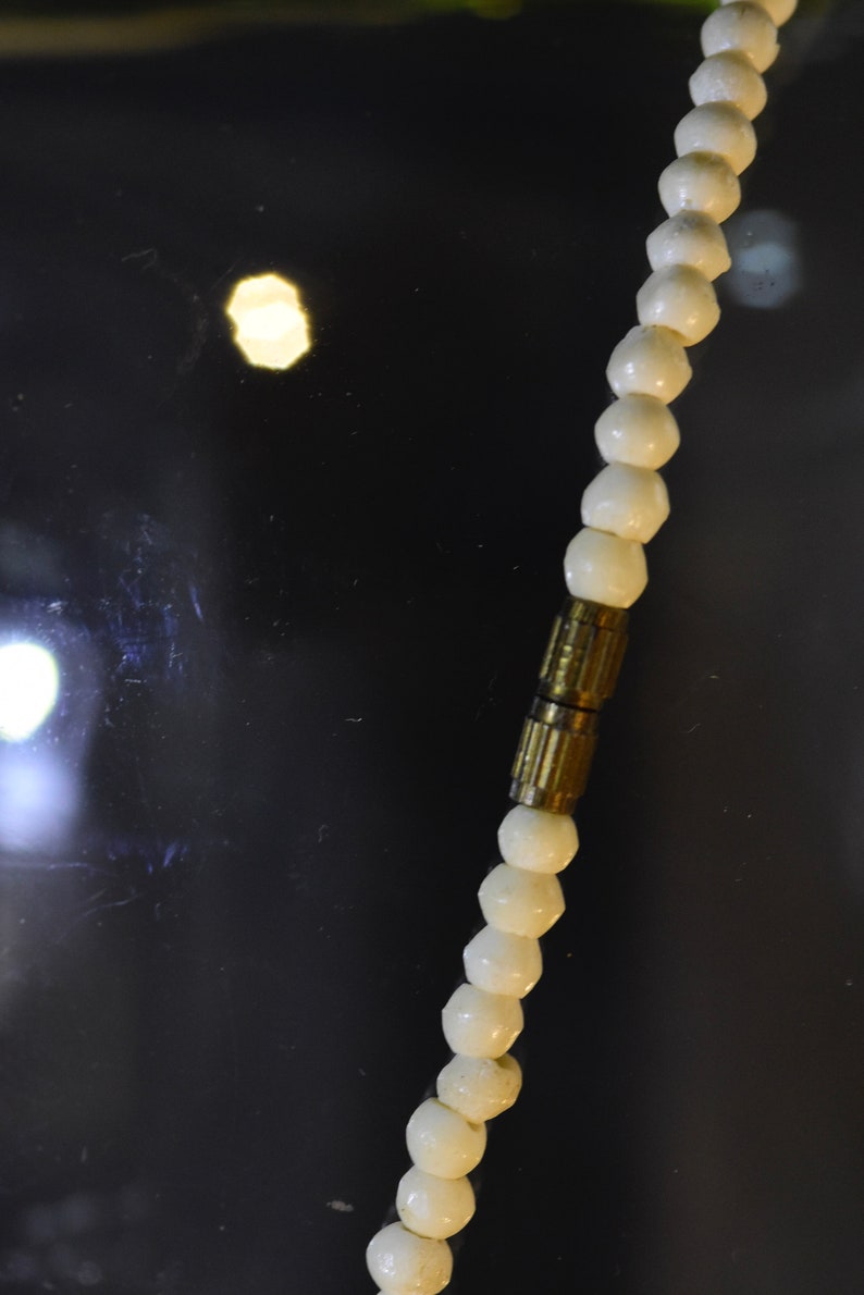 Radiant Vintage Bone Necklace
