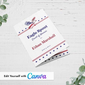 May include: A white folded card with red and blue accents, featuring an eagle illustration and text that reads "Eagle Spout Court of Honner for Ethan Marshall June 4, 20xx." The card has a patriotic theme.