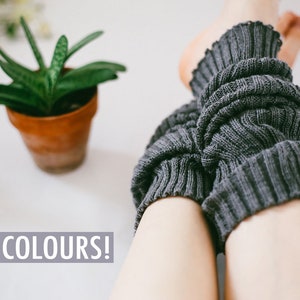 May include: Gray knitted leg warmers with a ribbed texture. 18 COLORS! text is visible in the image.