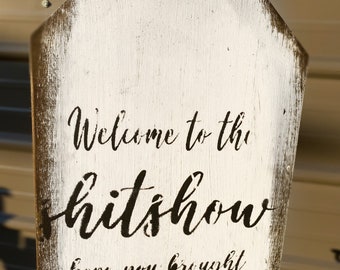 Welcome to the shit show door hanger