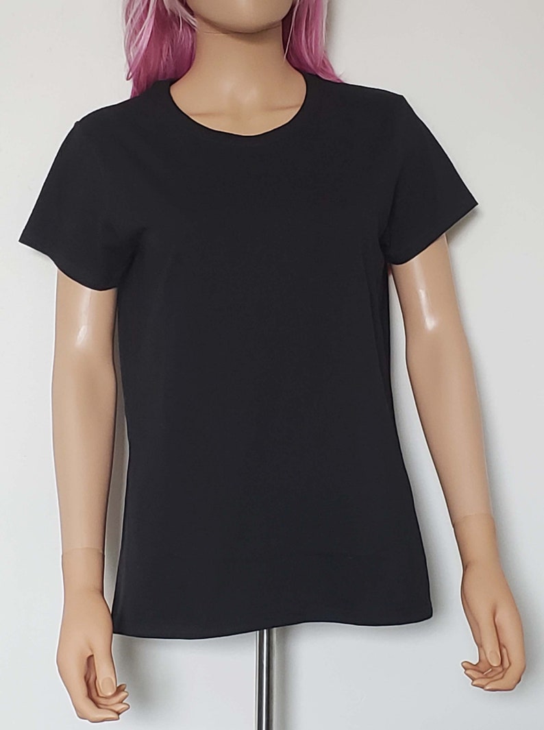 May include: A black short-sleeved t-shirt with a crew neck.